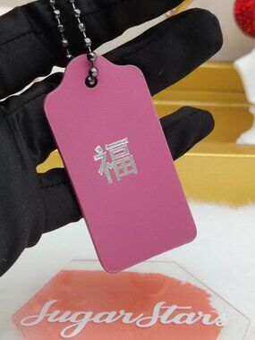 Coach leather tag